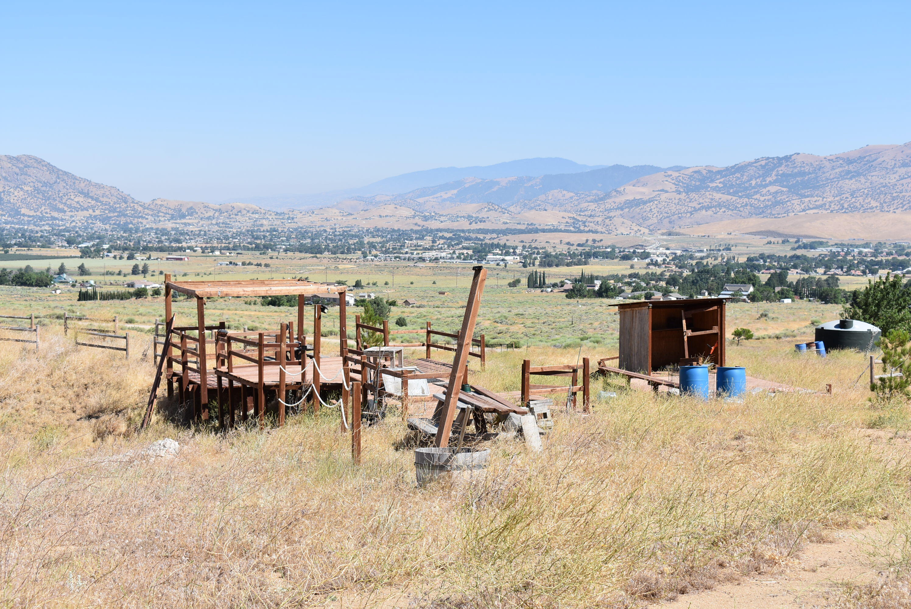 Ottawa Drive Tehachapi, CA 93561 - Photo 4 of 24 an aerial view of a swimming pool and mountain