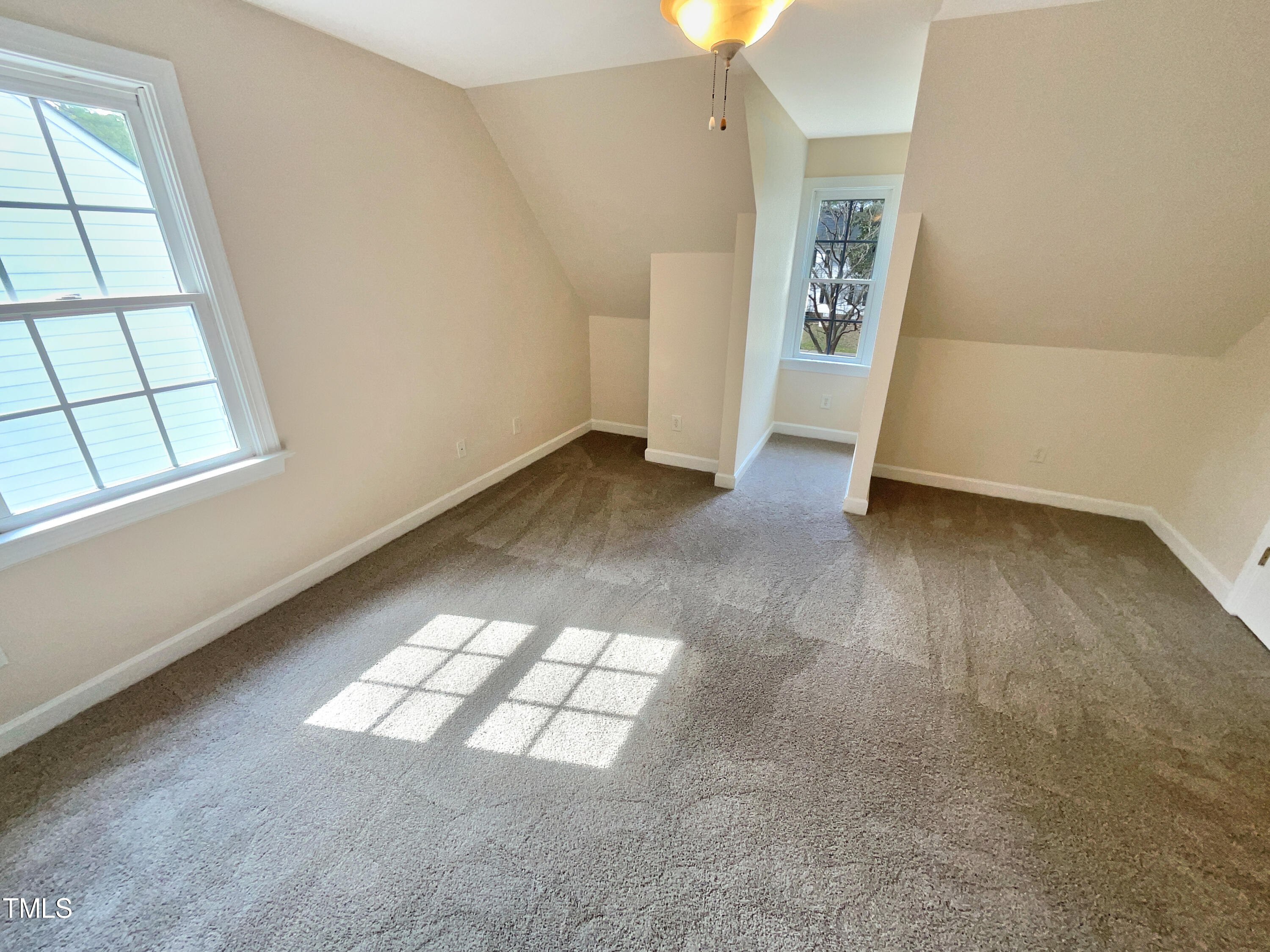 7212 Ewing Place Raleigh, NC 27616 - Photo 13 of 19 an empty room with windows