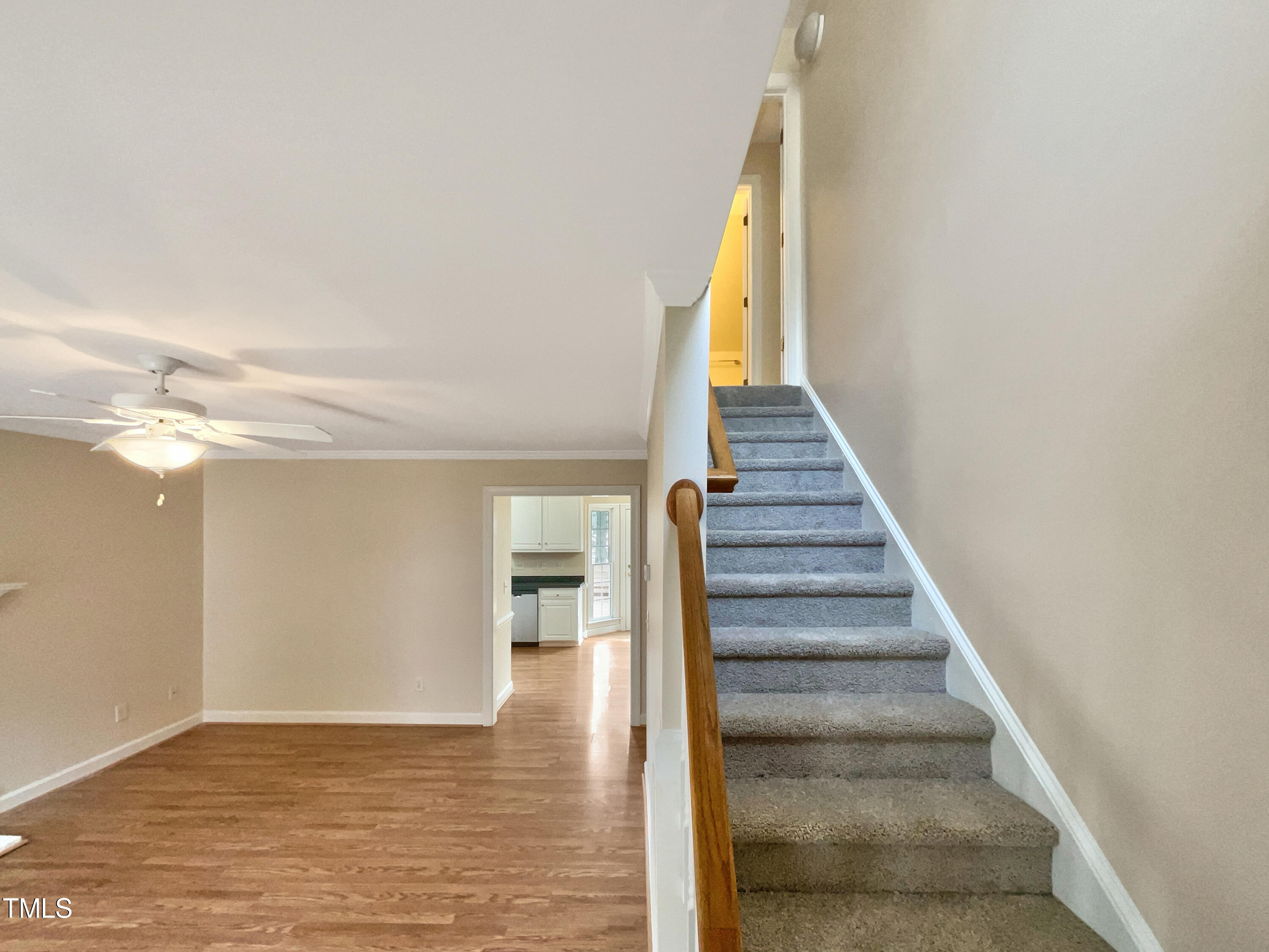 7212 Ewing Place Raleigh, NC 27616 - Photo 6 of 19 a view of entryway and hall with wooden floor