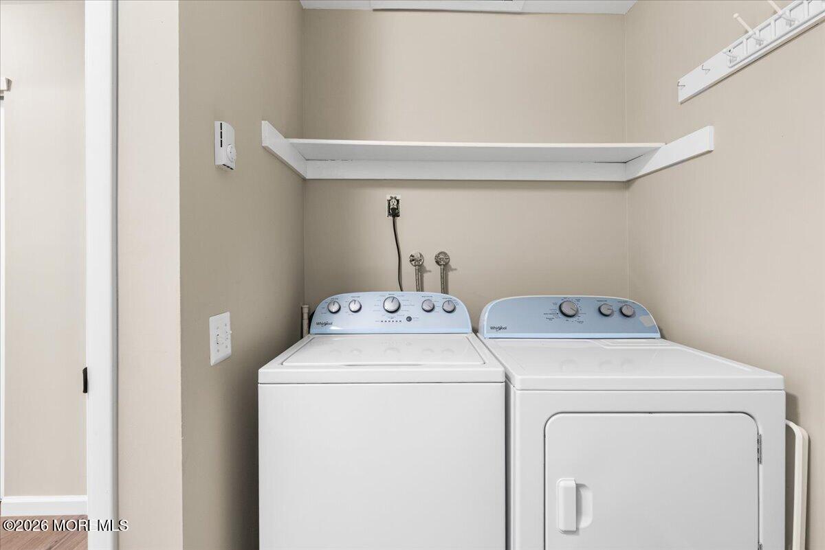 16 D Spring Street, Unit 50 Whiting, NJ 08759 - Photo 24 of 28 a utility room with dryer and washer
