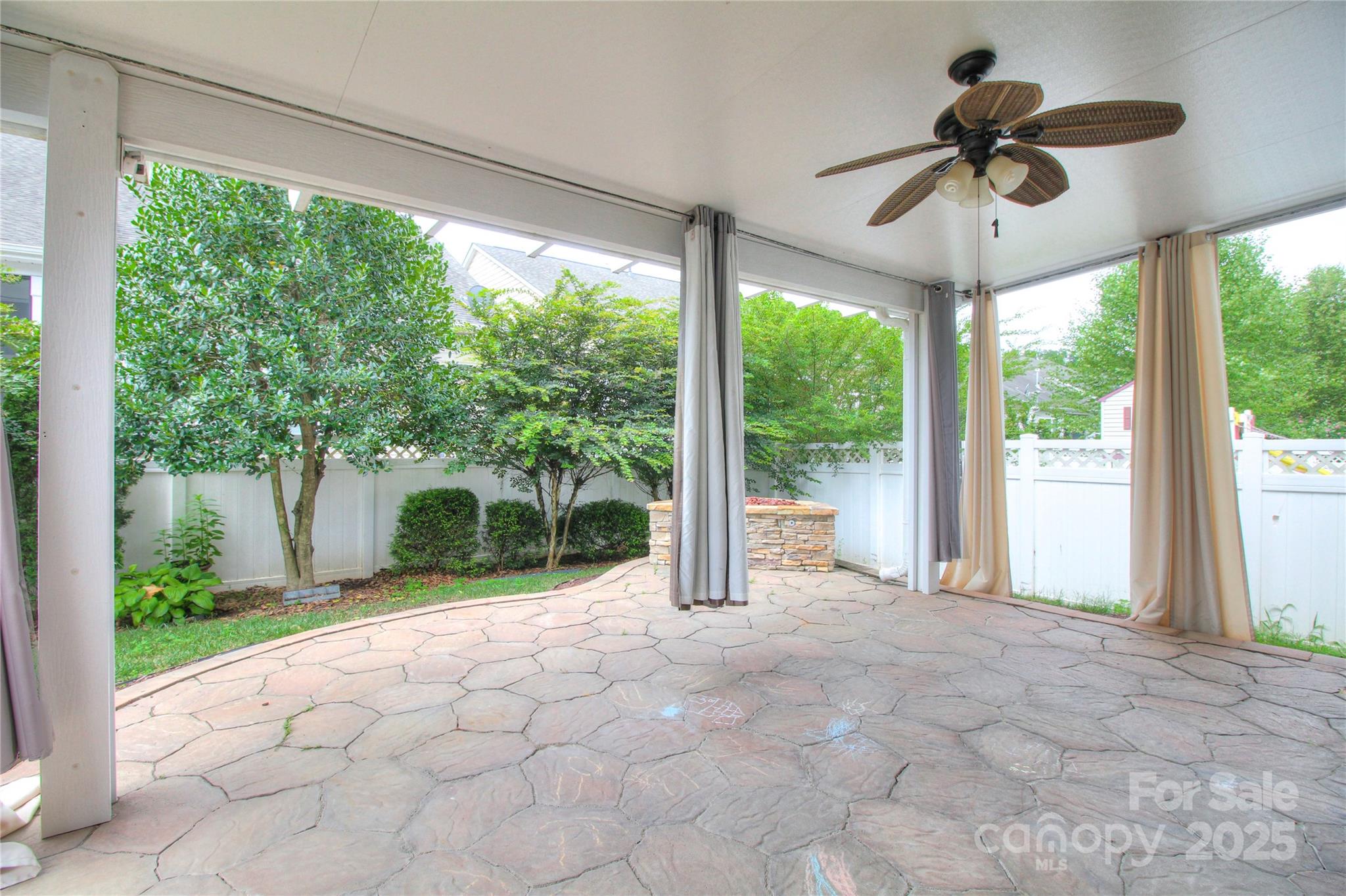 1012 Equipoise Drive Indian Trail, NC 28079 - Photo 16 of 31 a view of a porch with furniture and garden