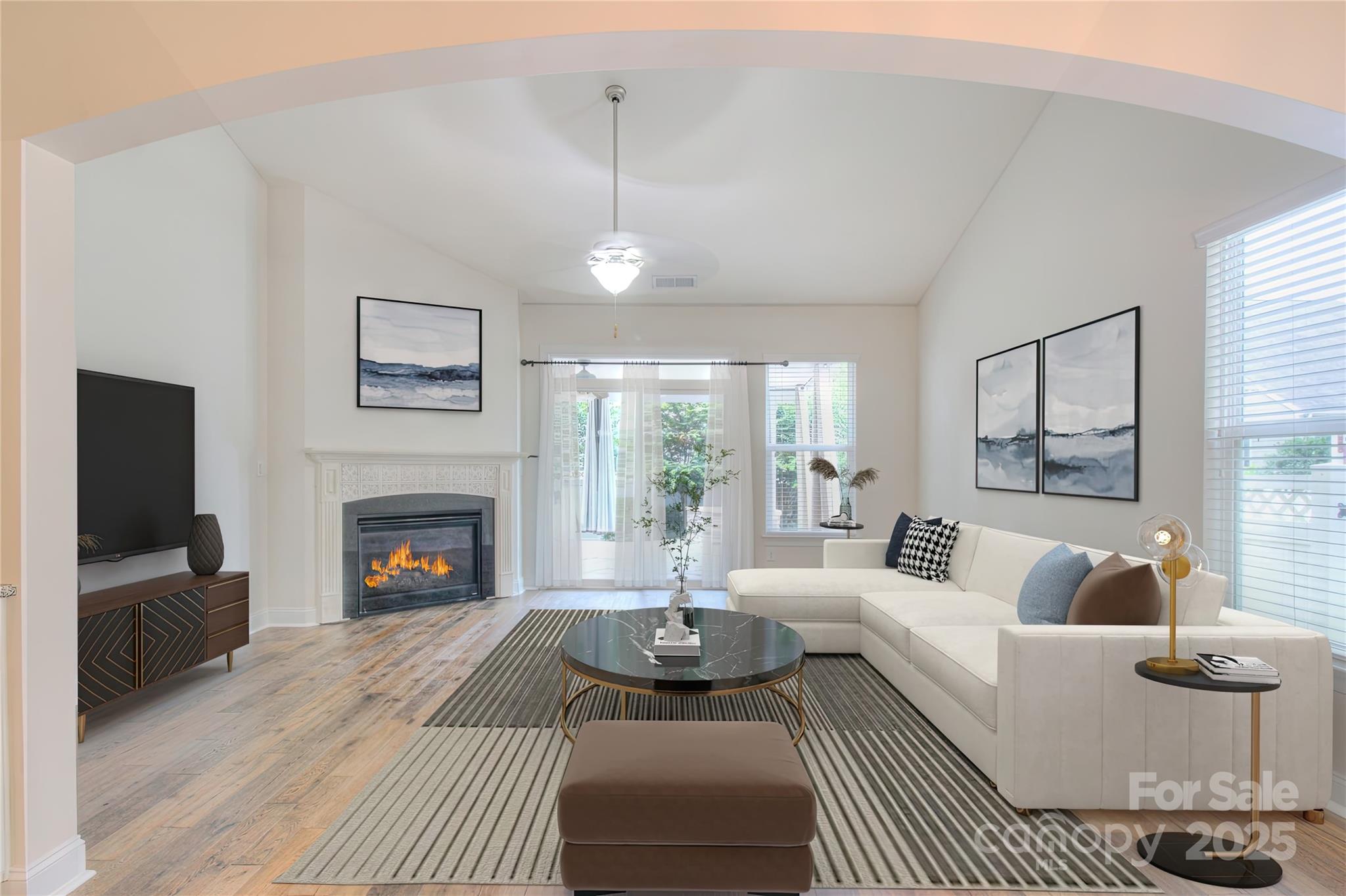 1012 Equipoise Drive Indian Trail, NC 28079 - Photo 2 of 31 a living room with furniture and a fireplace