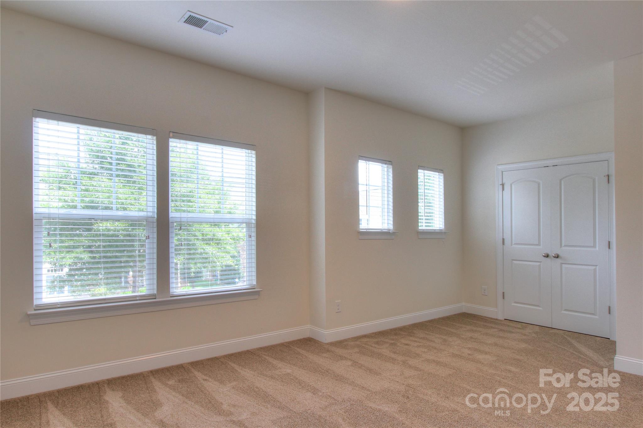 1012 Equipoise Drive Indian Trail, NC 28079 - Photo 21 of 31 a view of an empty room with a window