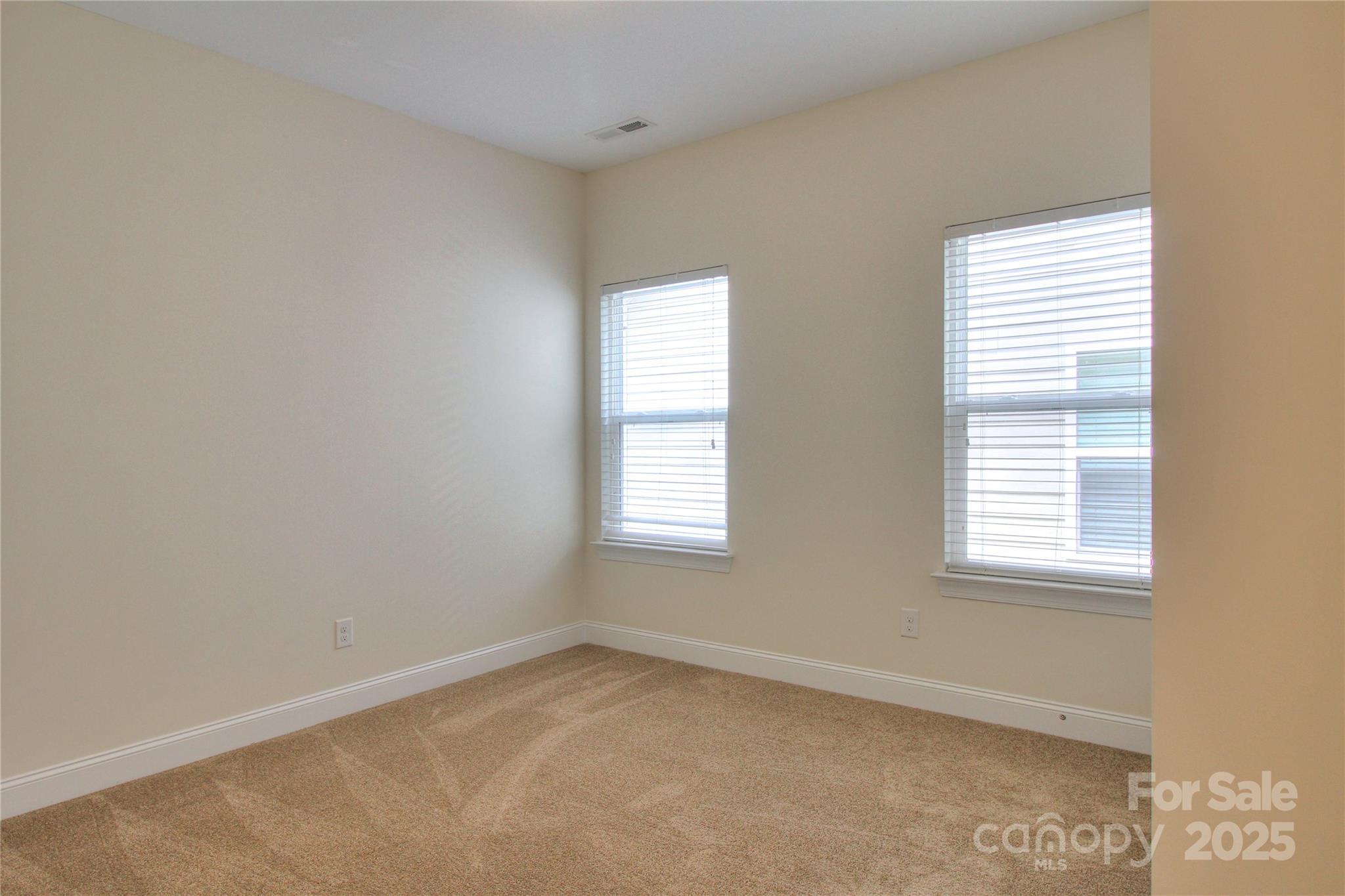 1012 Equipoise Drive Indian Trail, NC 28079 - Photo 22 of 31 an empty room with a window