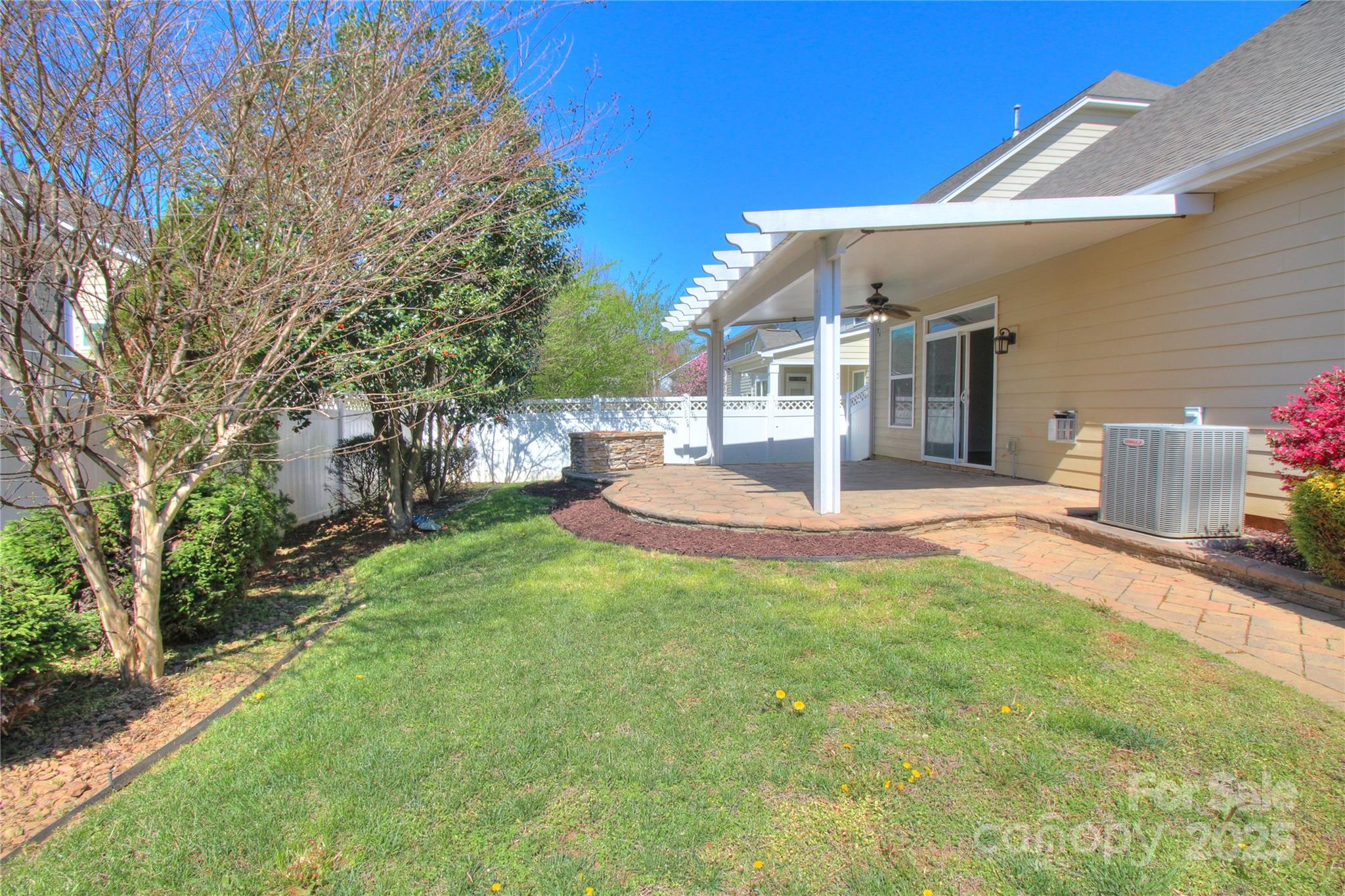 1012 Equipoise Drive Indian Trail, NC 28079 - Photo 27 of 31 a view of a house with backyard and a tree