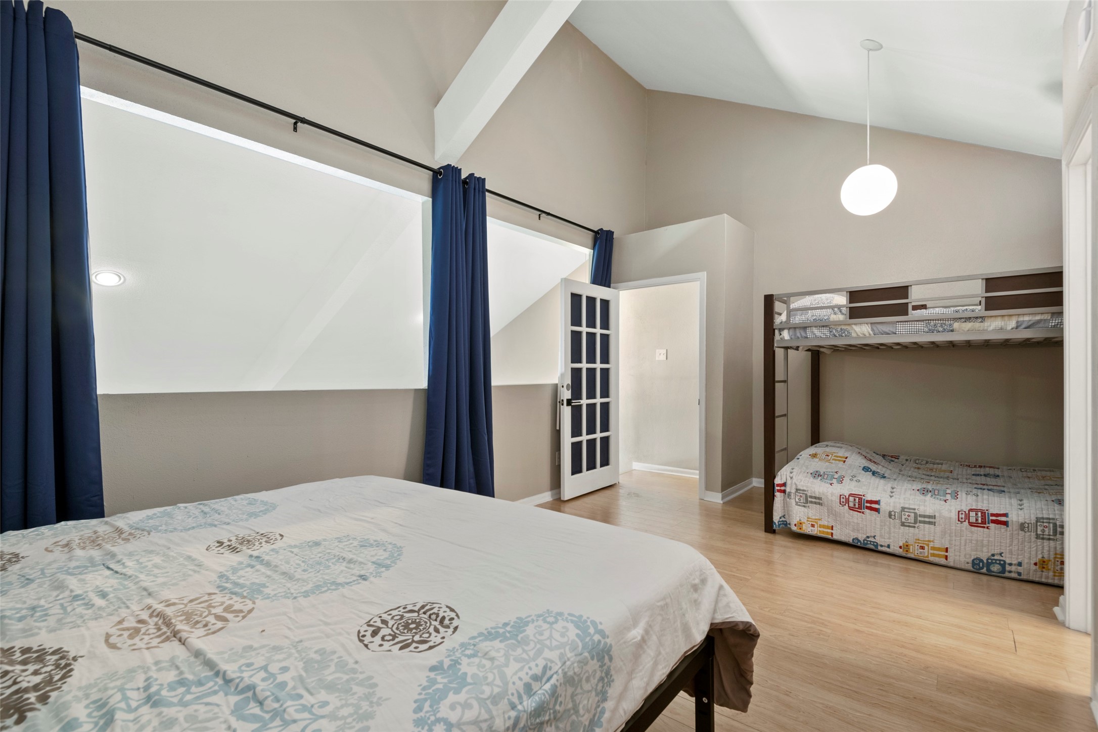 162 April Point Drive South Conroe, TX 77356 - Photo 15 of 26 a bedroom with a bed and a large mirror