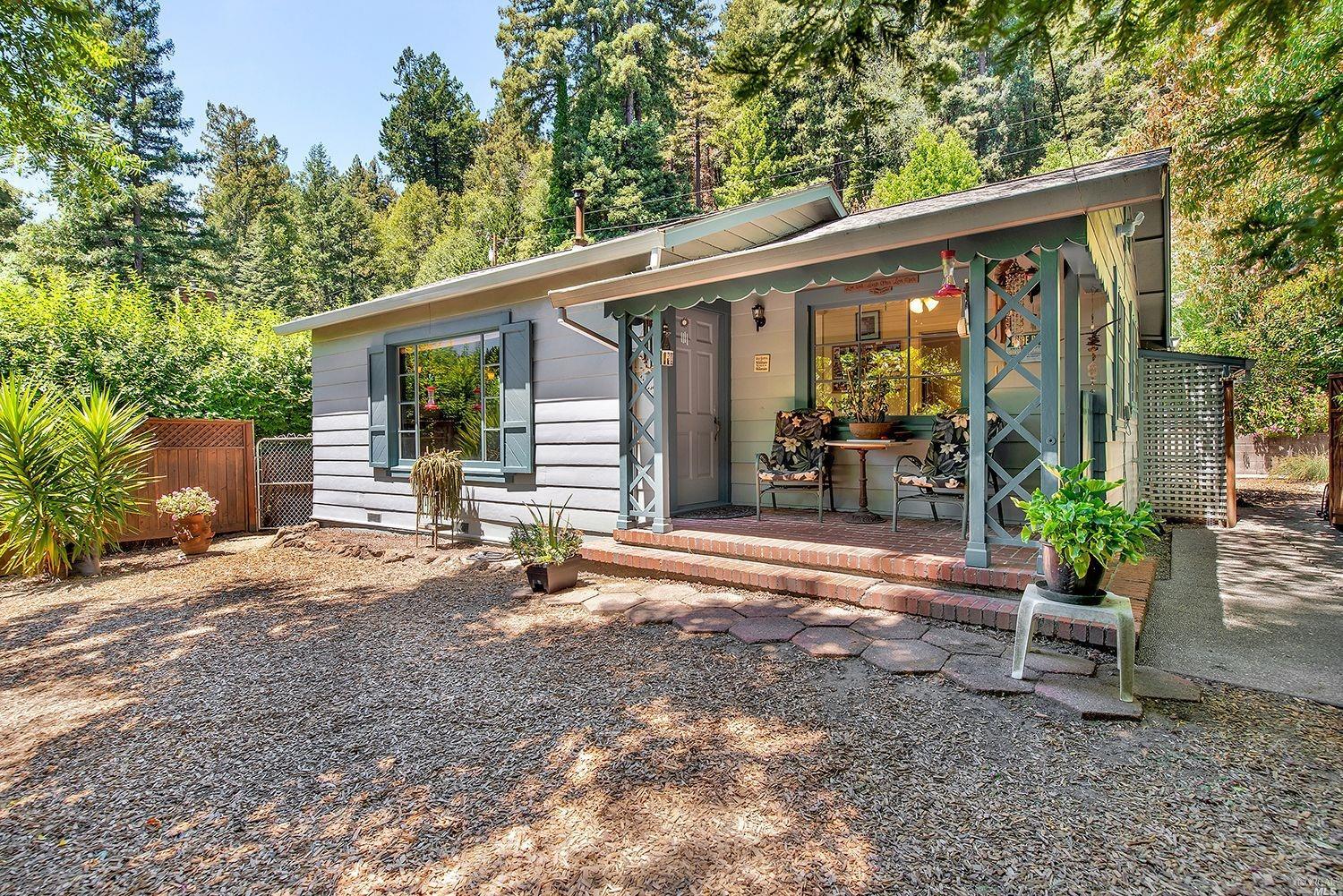 15241 Orchard Road Guerneville, CA 95446 - Photo 1 of 1 a view of a house with backyard and sitting area