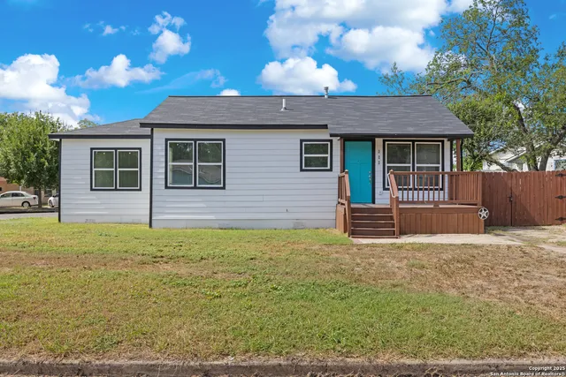 a house view with a garden space