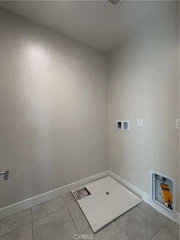 an empty room with a bench