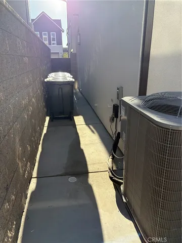 a view of balcony with furniture
