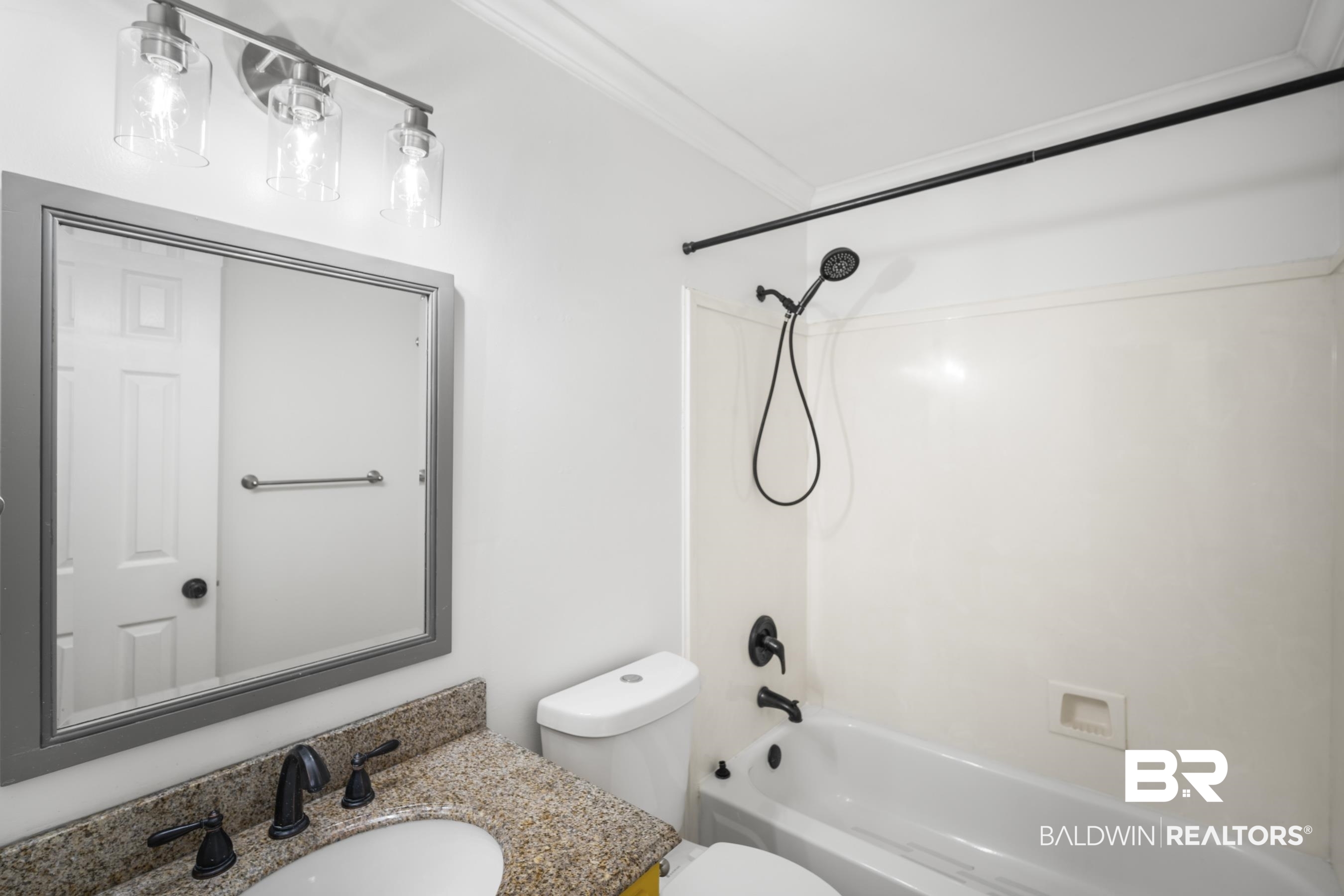 3101 Autumn Ridge Drive West Mobile, AL 36695 - Photo 20 of 36 Bathroom with washtub / shower combination, vanity, and crown molding