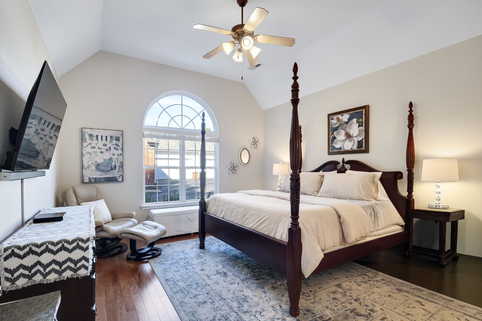 41 Peyton Ridge Drive, Unit 39 Collierville, TN 38017 - Photo 13 of 28 a bedroom with a bed and a chandelier