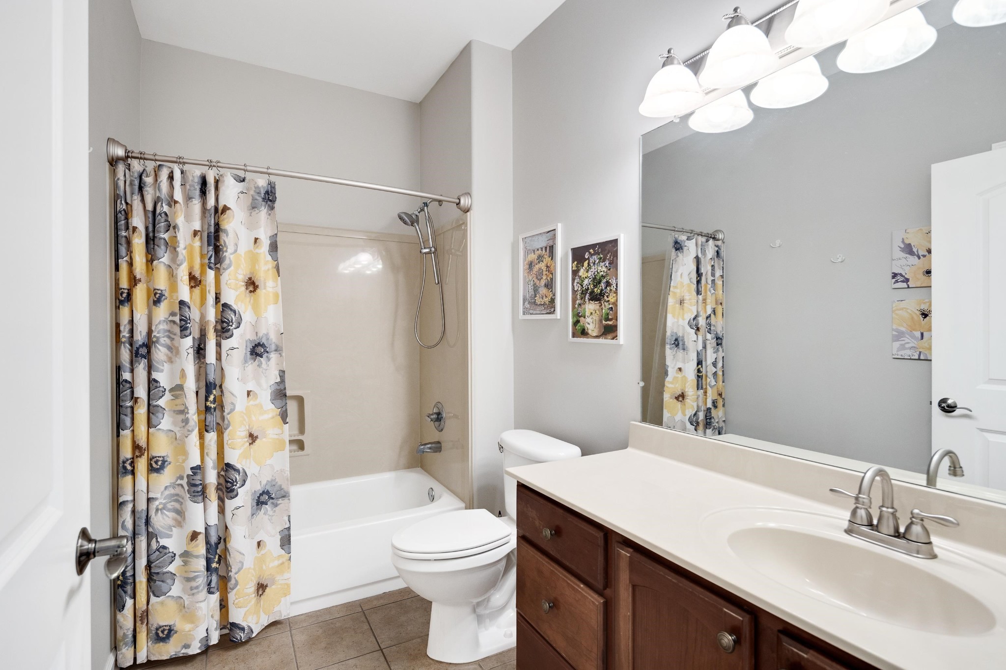 41 Peyton Ridge Drive, Unit 39 Collierville, TN 38017 - Photo 16 of 28 a bathroom with a sink vanity mirror and toilet
