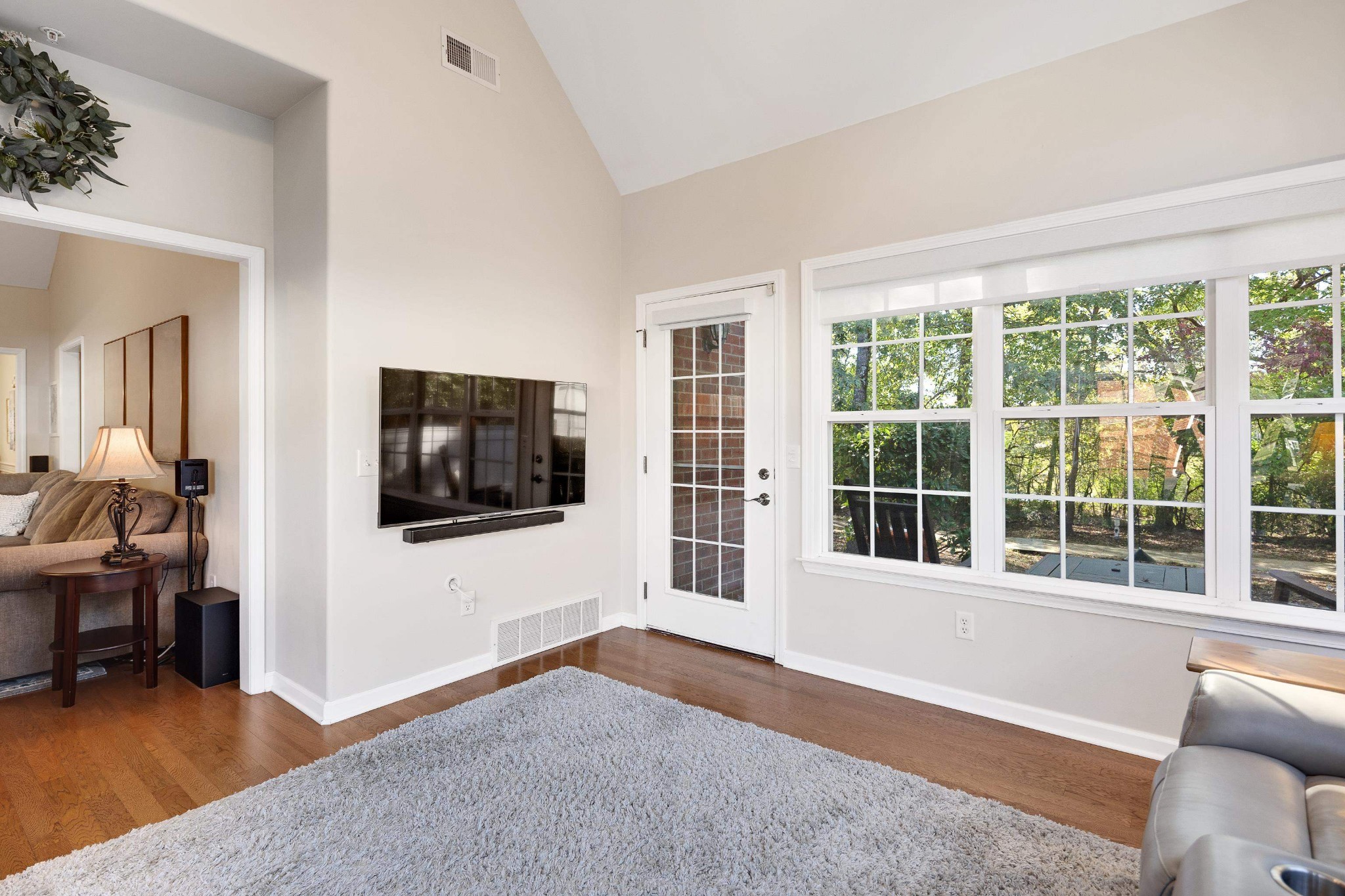 41 Peyton Ridge Drive, Unit 39 Collierville, TN 38017 - Photo 19 of 28 a living room with furniture and a flat screen tv