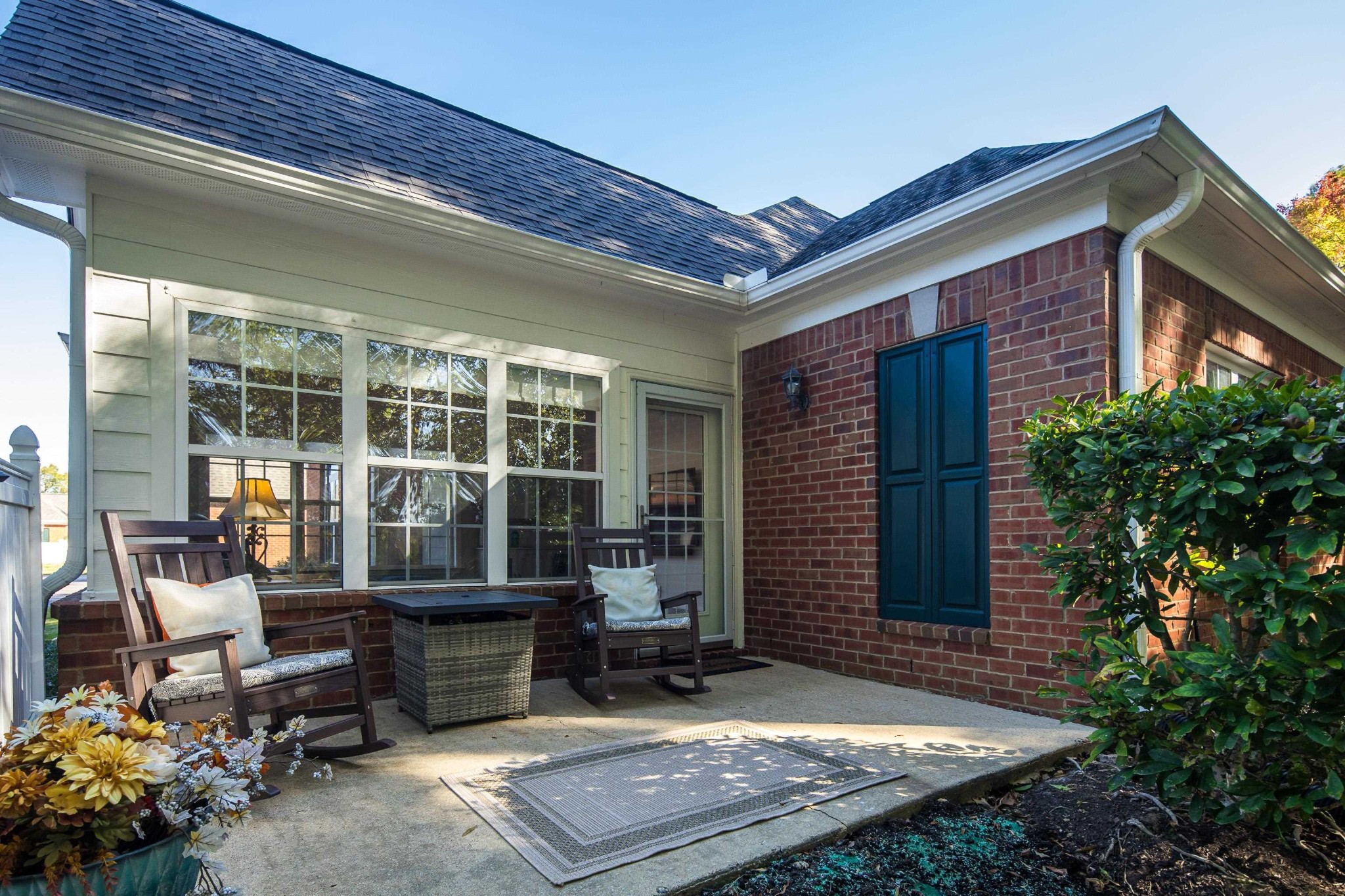 41 Peyton Ridge Drive, Unit 39 Collierville, TN 38017 - Photo 21 of 28 a view of house with backyard outdoor seating and plants