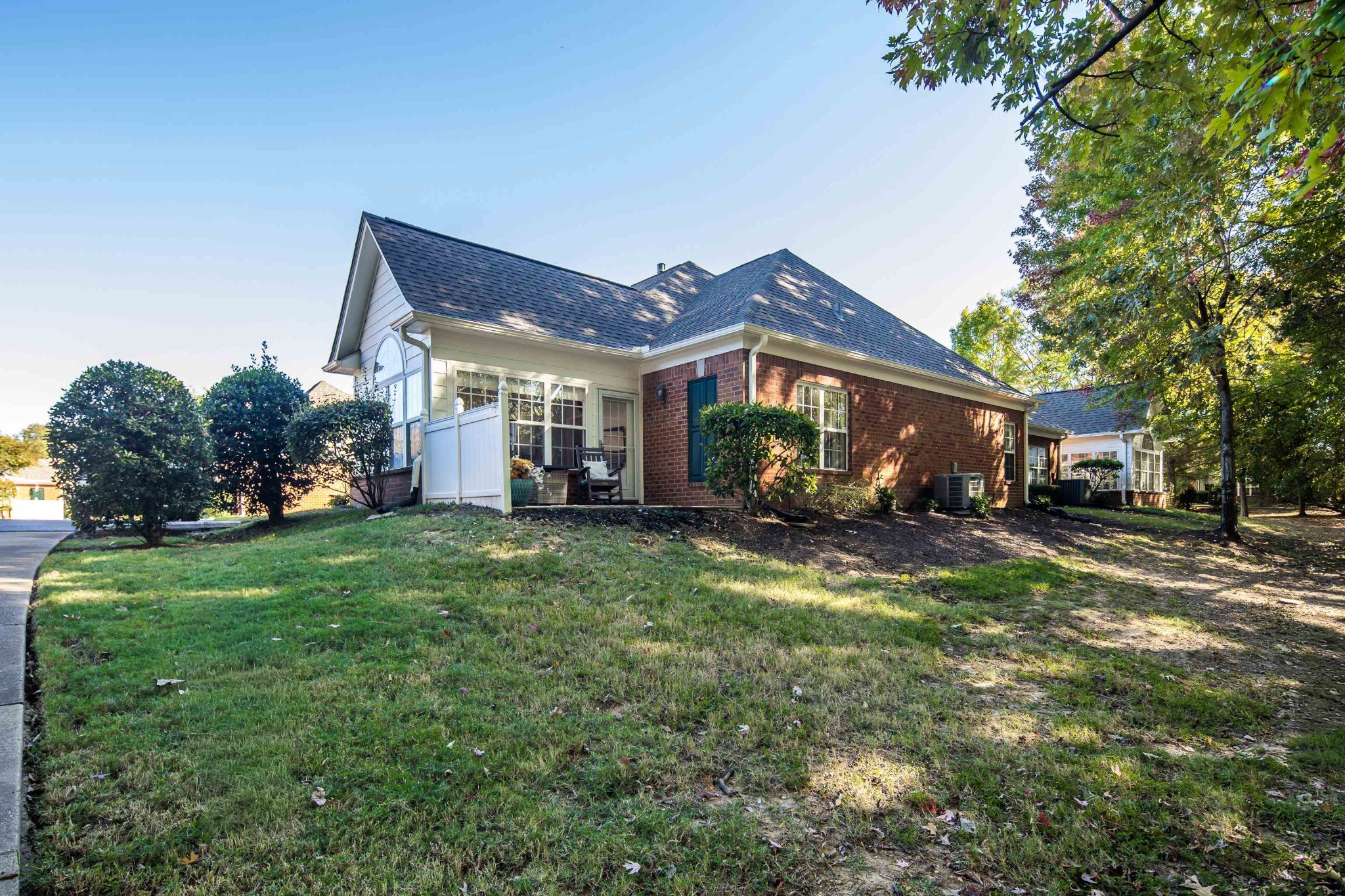 41 Peyton Ridge Drive, Unit 39 Collierville, TN 38017 - Photo 22 of 28 a view of a house with a big yard and potted plants
