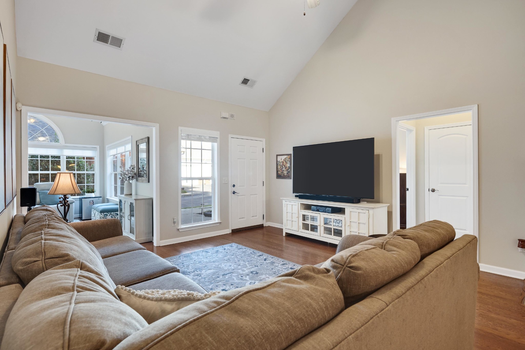 41 Peyton Ridge Drive, Unit 39 Collierville, TN 38017 - Photo 5 of 28 a living room with furniture and a flat screen tv