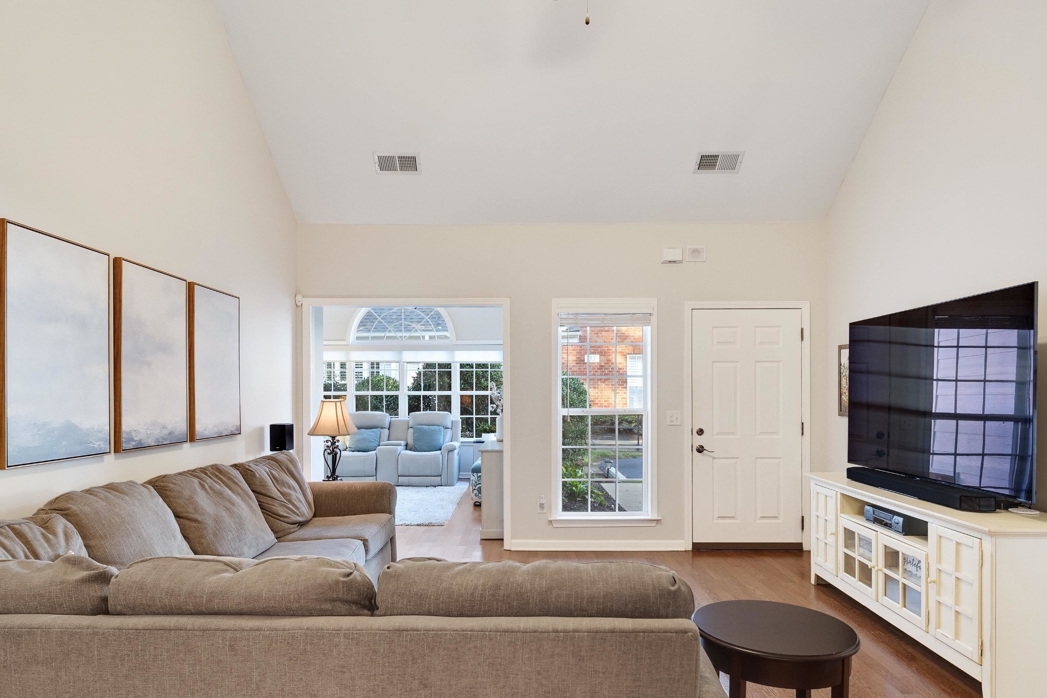 41 Peyton Ridge Drive, Unit 39 Collierville, TN 38017 - Photo 6 of 28 a living room with furniture window and a potted plant