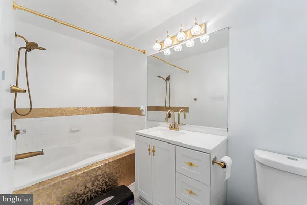 a bathroom with a sink and a bathtub