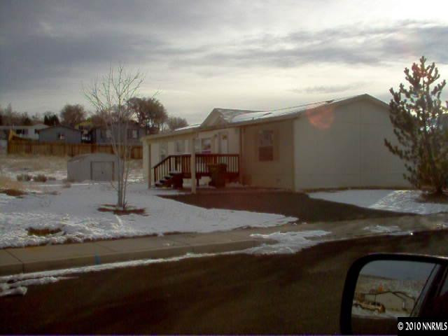7670 Lytton Road Reno, NV 89506 - Photo 2 of 2 a view of street with parked cars