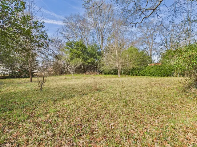 a room with furniture and a book shelf