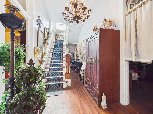 a living room with patio area furniture and a window