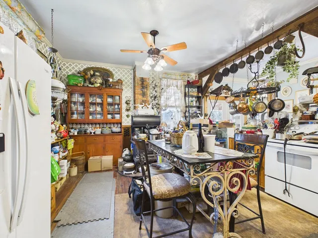 a view of a workspace with furniture