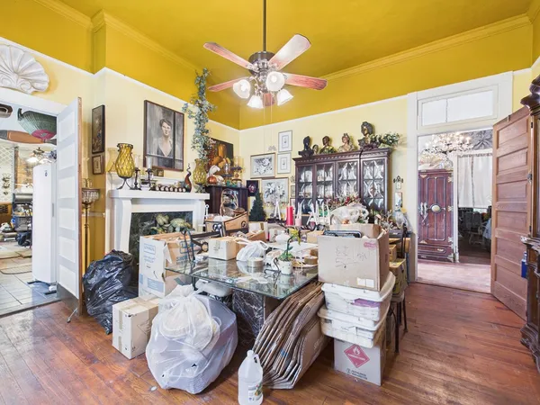 a view of a living room and a wooden floor