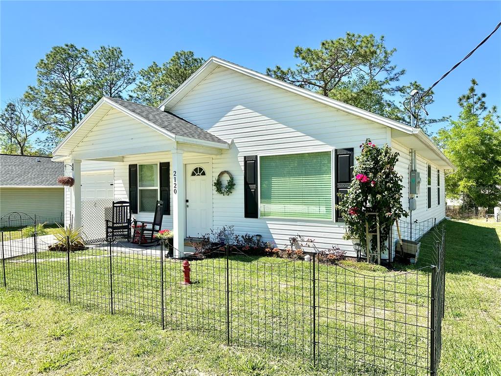 2120 Southwest 142nd Court Road Ocala, FL 34481 - Photo 2 of 14 a view of a house with patio