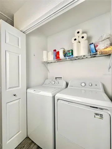 a utility room with dryer and washer
