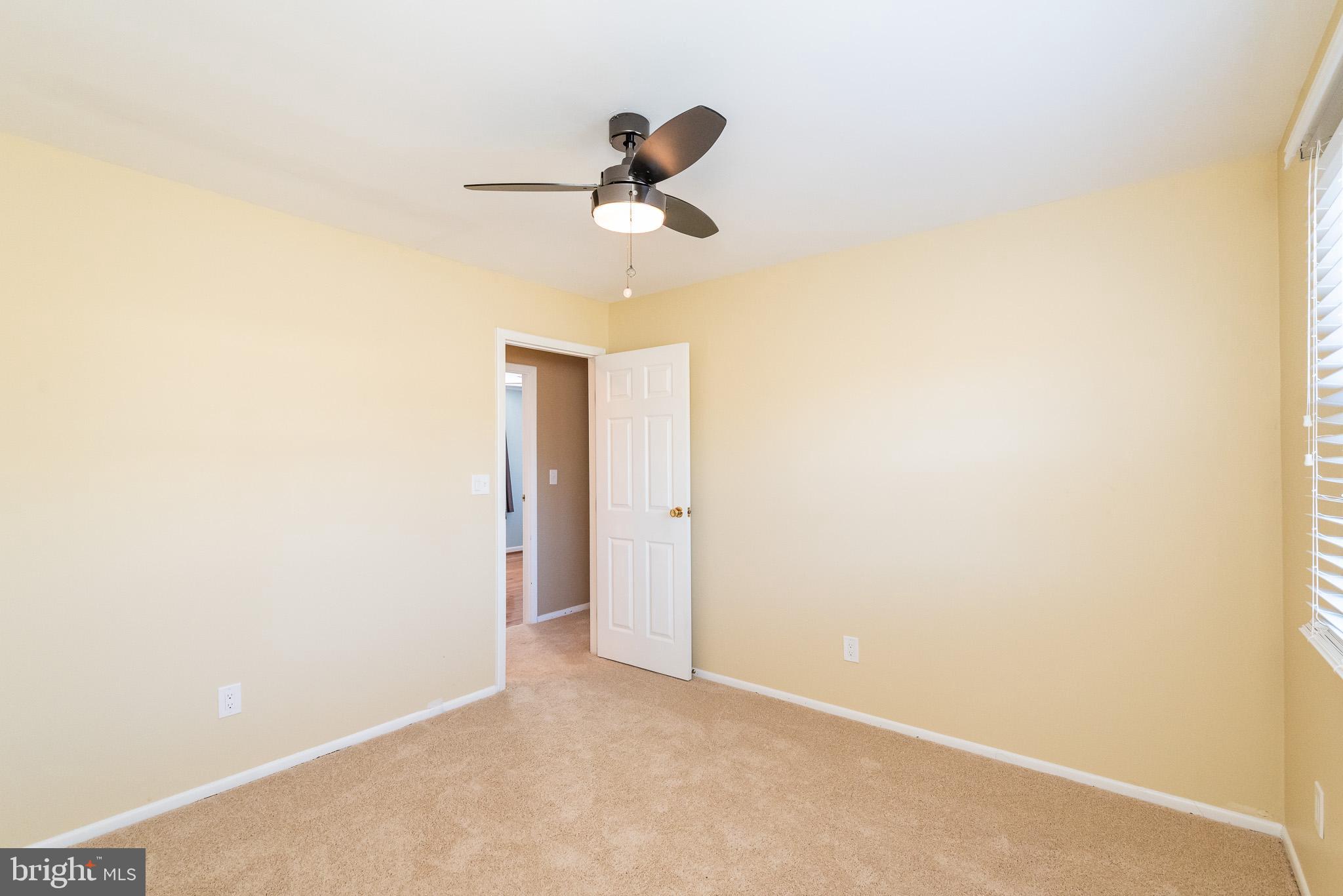 2703 Hunting Ridge Court Baldwin, MD 21013 - Photo 34 of 71 a view of cabinet with a ceiling fan