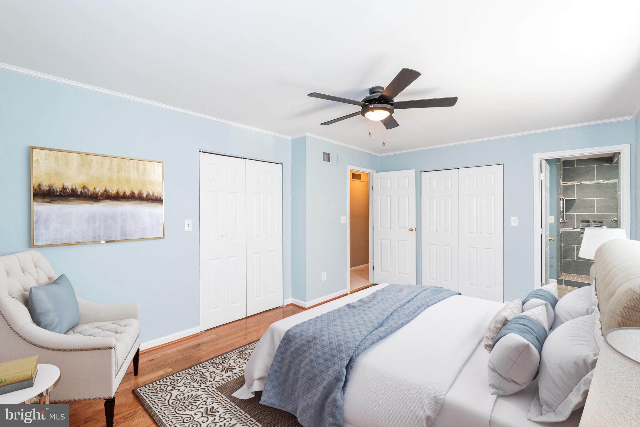2703 Hunting Ridge Court Baldwin, MD 21013 - Photo 5 of 71 a bedroom with a bed a chair and potted plant