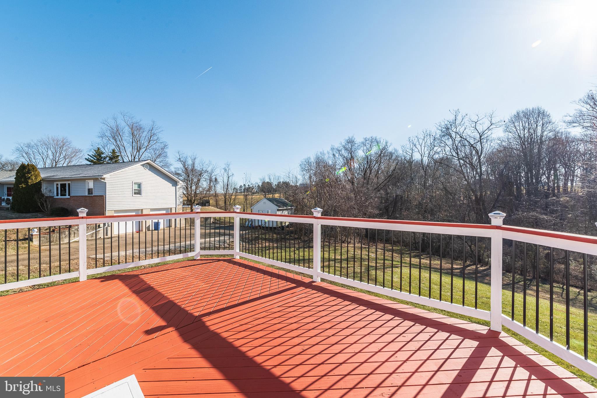 2703 Hunting Ridge Court Baldwin, MD 21013 - Photo 61 of 71 a view of a balcony with wooden floor and fence