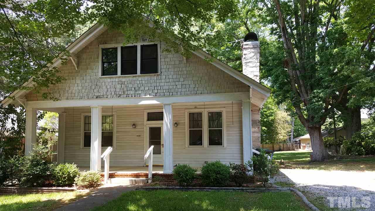 508 Burton Street Raleigh, NC 27608 - Photo 1 of 25 a front view of a house with a yard