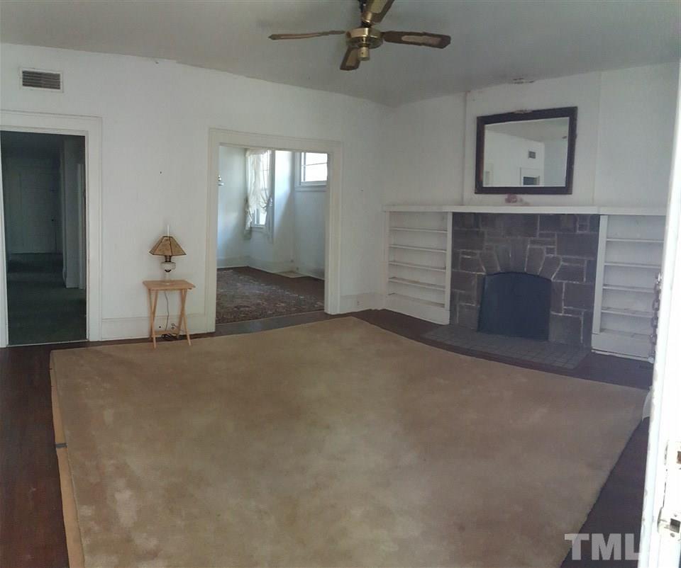 508 Burton Street Raleigh, NC 27608 - Photo 11 of 25 a view of a livingroom with a fireplace