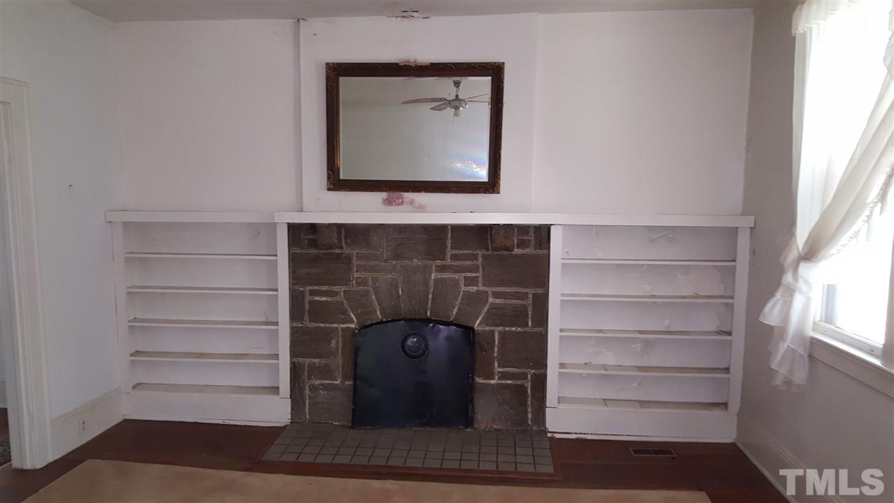 508 Burton Street Raleigh, NC 27608 - Photo 12 of 25 a room with walk in closet and a window