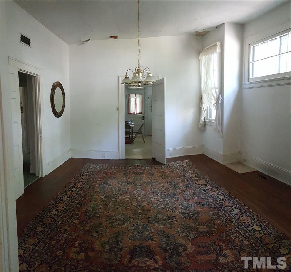 508 Burton Street Raleigh, NC 27608 - Photo 13 of 25 a view of a windows and chandelier in a room