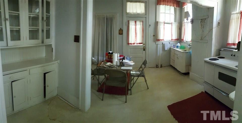508 Burton Street Raleigh, NC 27608 - Photo 15 of 25 a living room with furniture and a window