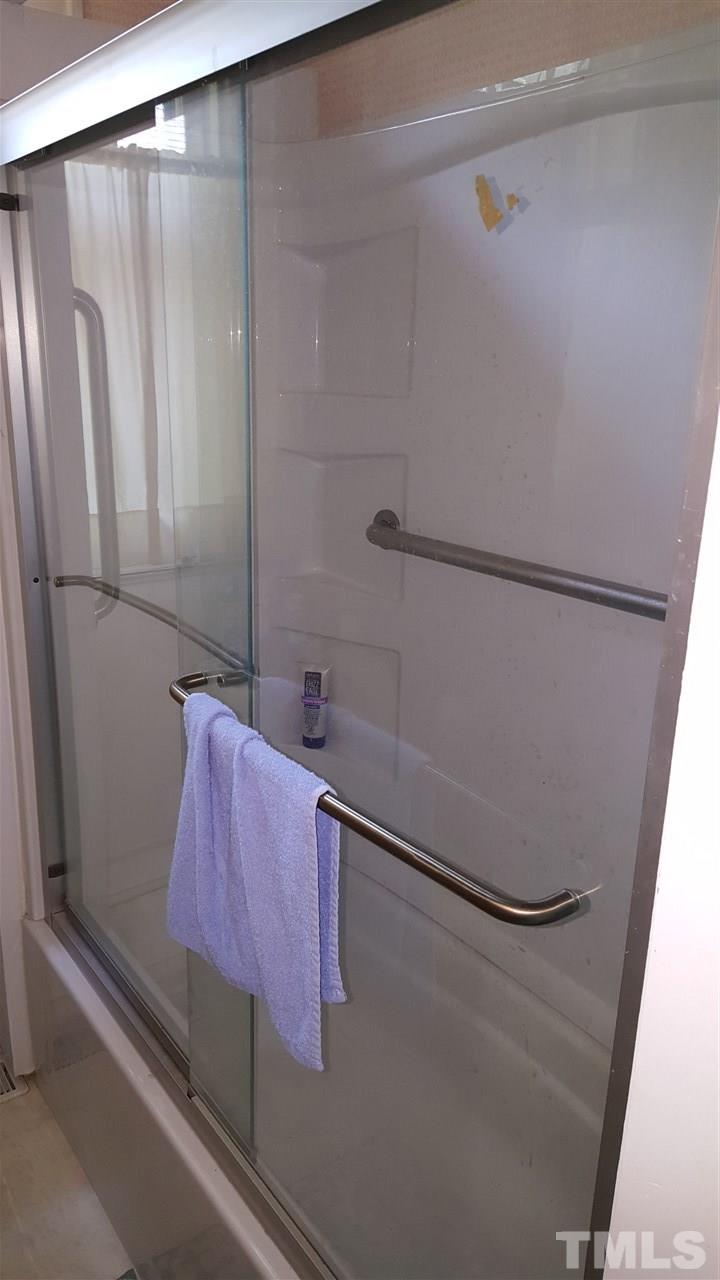 508 Burton Street Raleigh, NC 27608 - Photo 19 of 25 a bathroom with a shower