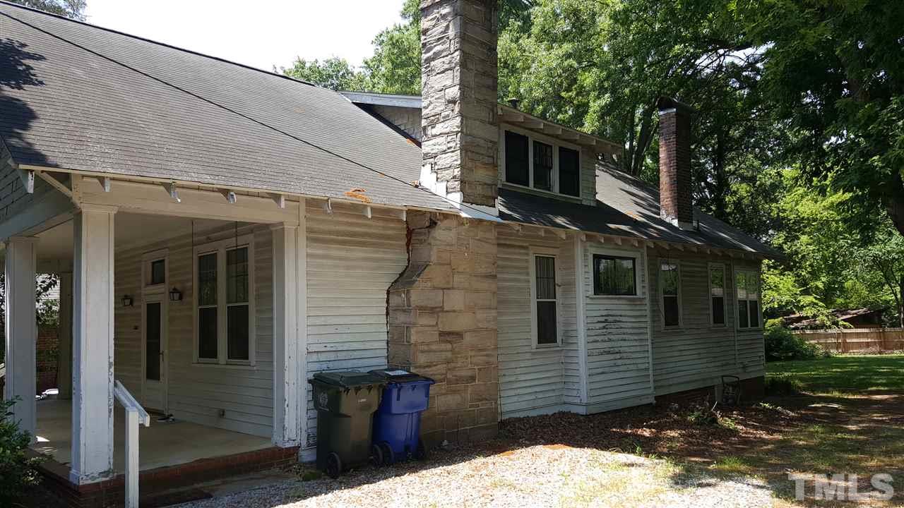508 Burton Street Raleigh, NC 27608 - Photo 4 of 25 a view of a house with a yard