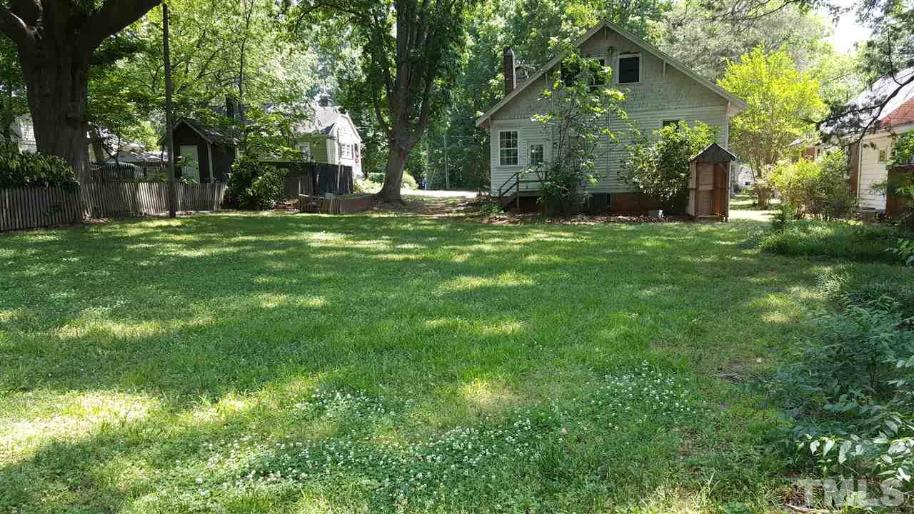 508 Burton Street Raleigh, NC 27608 - Photo 8 of 25 a view of a house with a yard