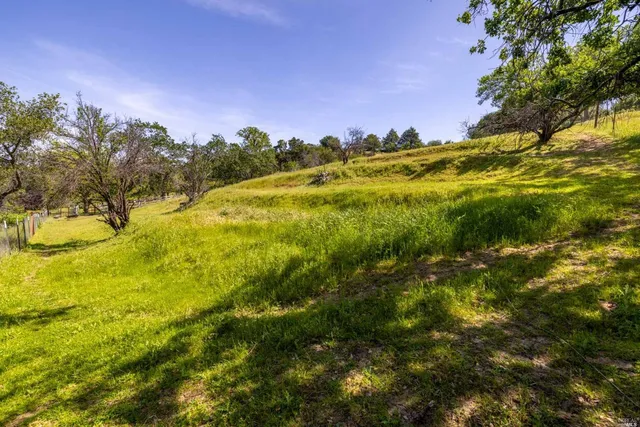 a view of an ocean and a houses
