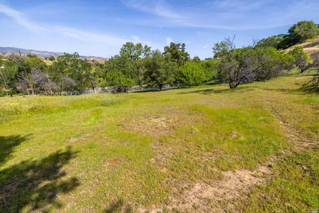 a view of an ocean and a mountain