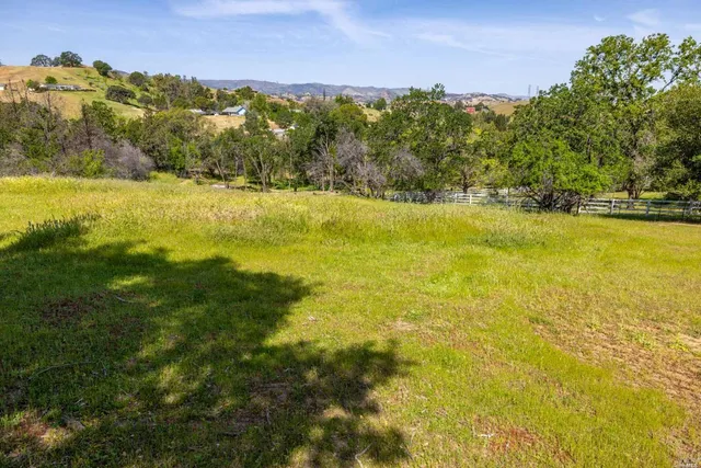 a view of an ocean and a yard