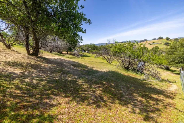 a view of lake and mountains
