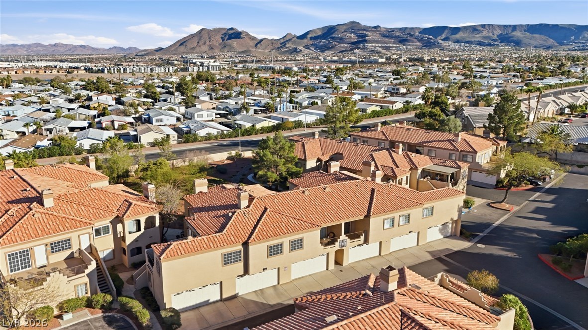 1851 Hillpointe Road, Unit 1311 Henderson, NV 89074 - Photo 43 of 47 Aerial perspective of suburban area with mountains