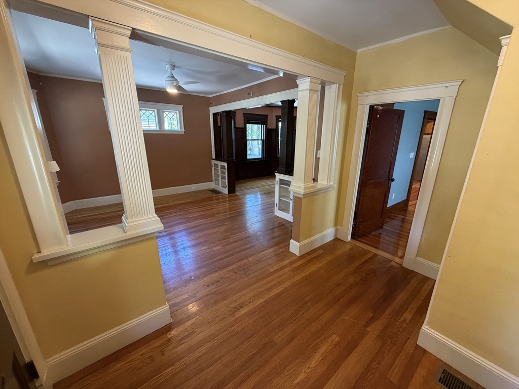 12-14 Warwick Road, Unit 12 Belmont, MA 02478 - Photo 6 of 15 wooden floor in an empty room with a window