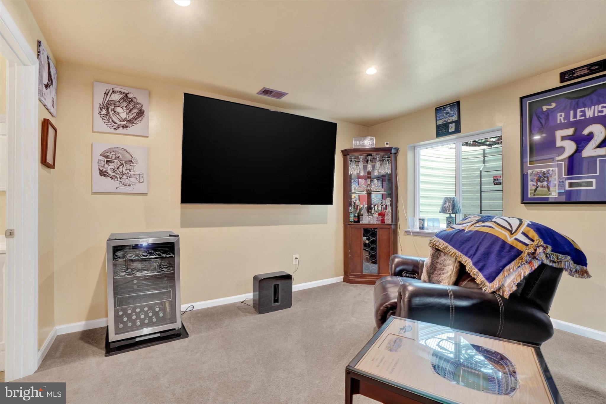 568 Monocacy Trail Spring Grove, PA 17362 - Photo 29 of 52 a living room with furniture a flat screen tv and gym equipment
