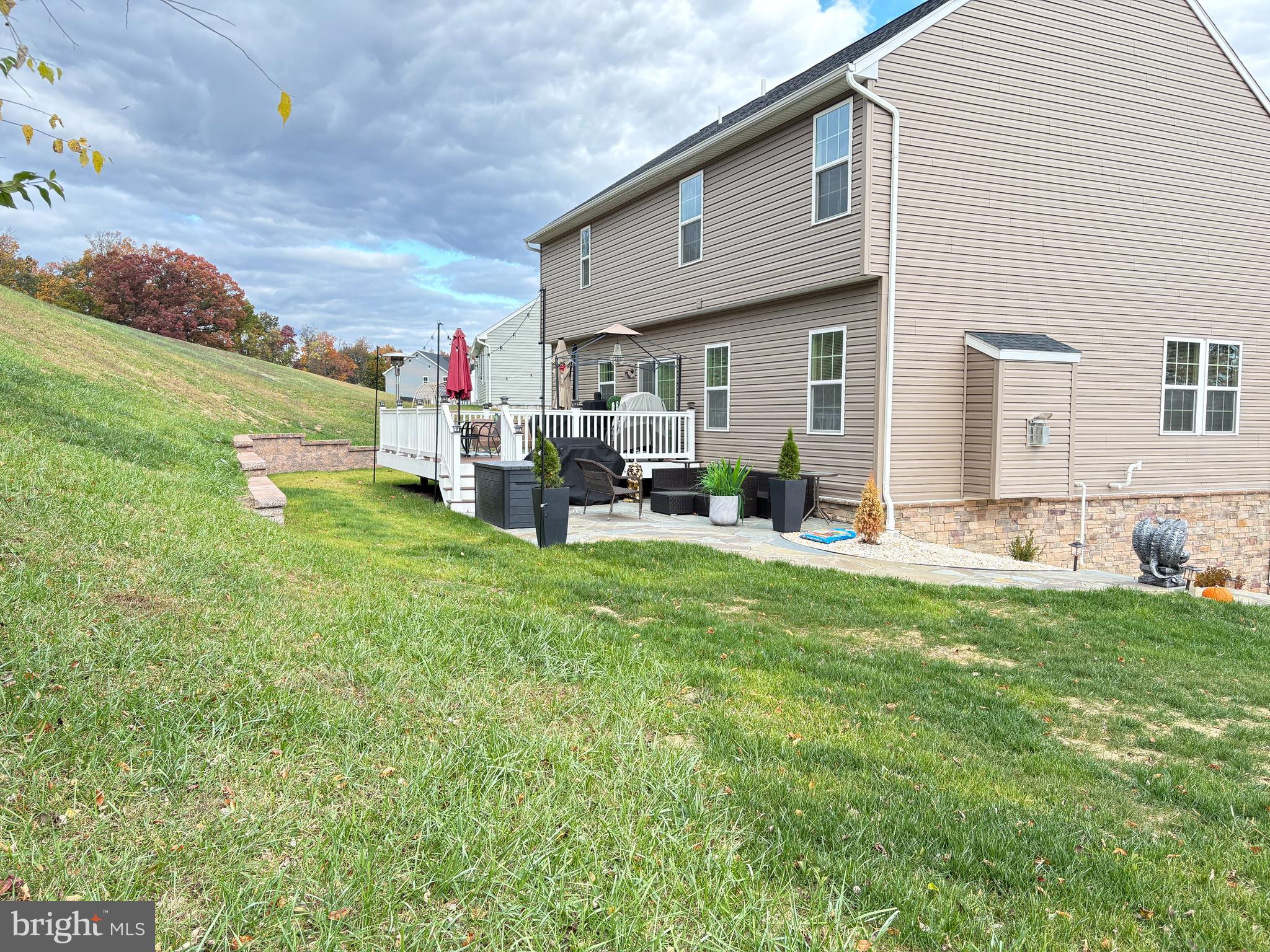 568 Monocacy Trail Spring Grove, PA 17362 - Photo 32 of 48 a backyard of a house with table and chairs