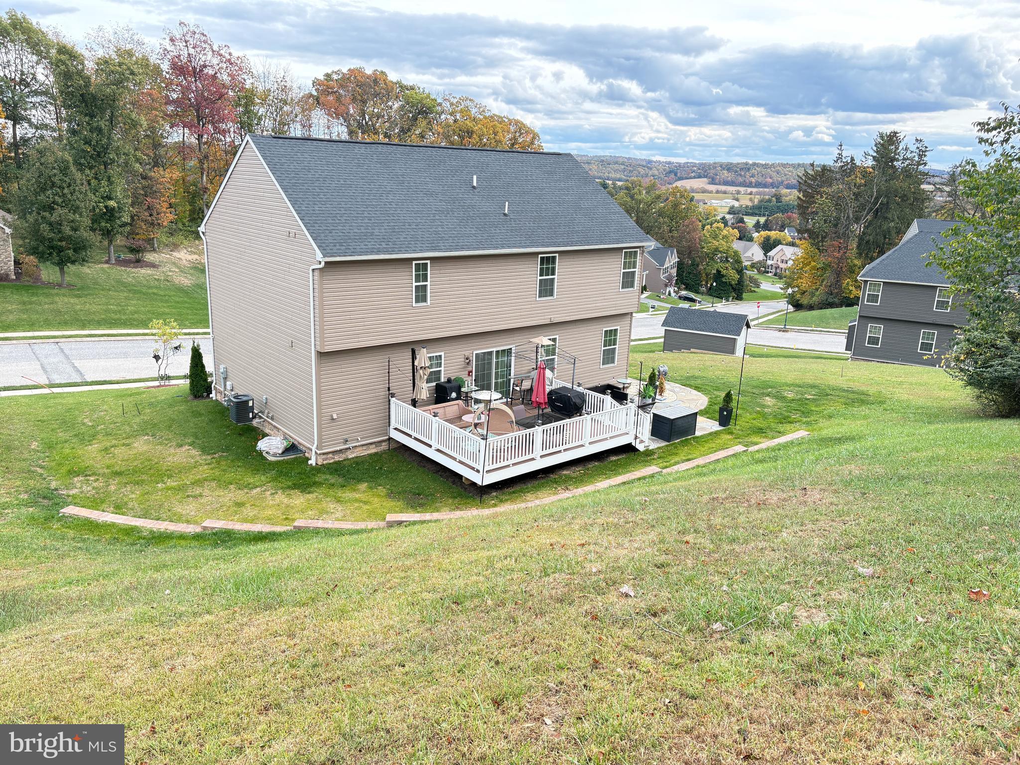568 Monocacy Trail Spring Grove, PA 17362 - Photo 34 of 52 a aerial view of a house with swimming pool and a yard